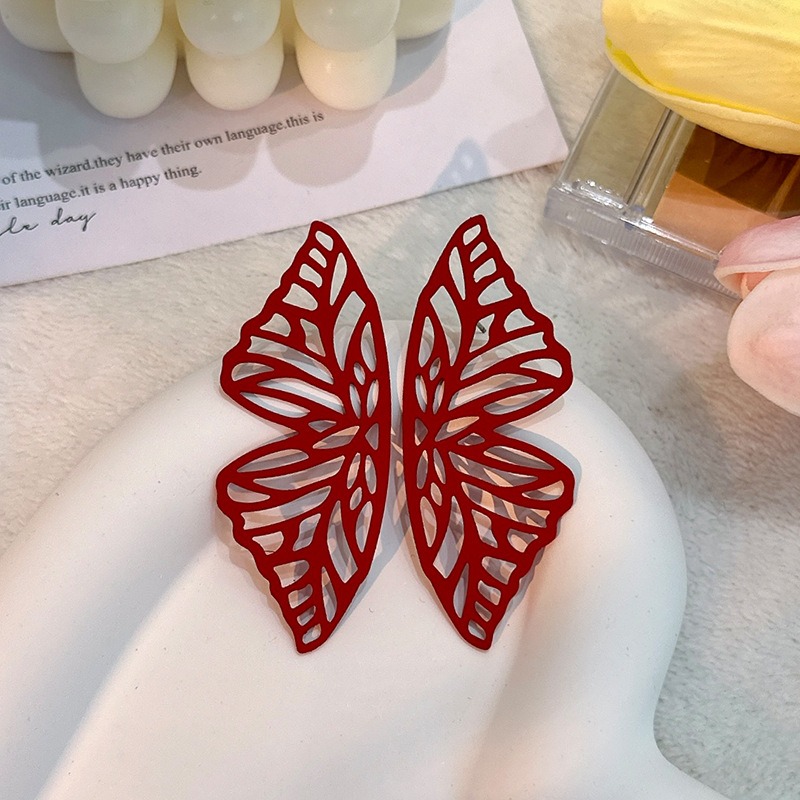 Hollow out butterfly earrings, simple and solid color fashionable earrings — image 3