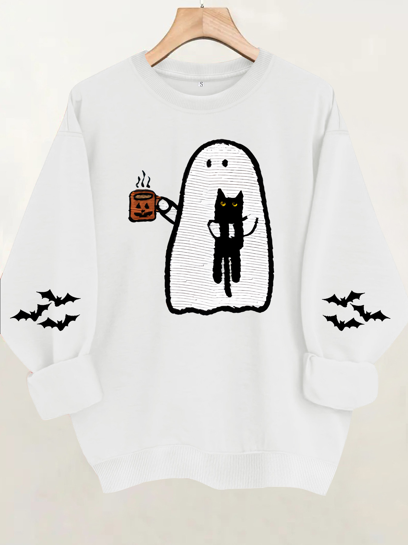 Ghost holding black cat with fleece hoodie — image 7