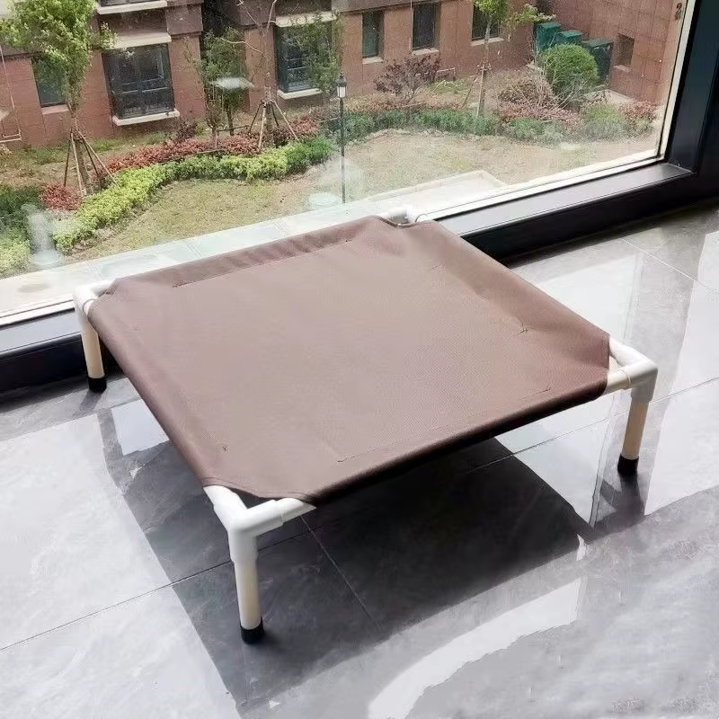 Cama de Acampada para Mascotas Cama Elevada para Perros Colapsable Casa para Gatos Portátil y Limpiable Camas para Puppies Hamaca para Perros — imagen 1