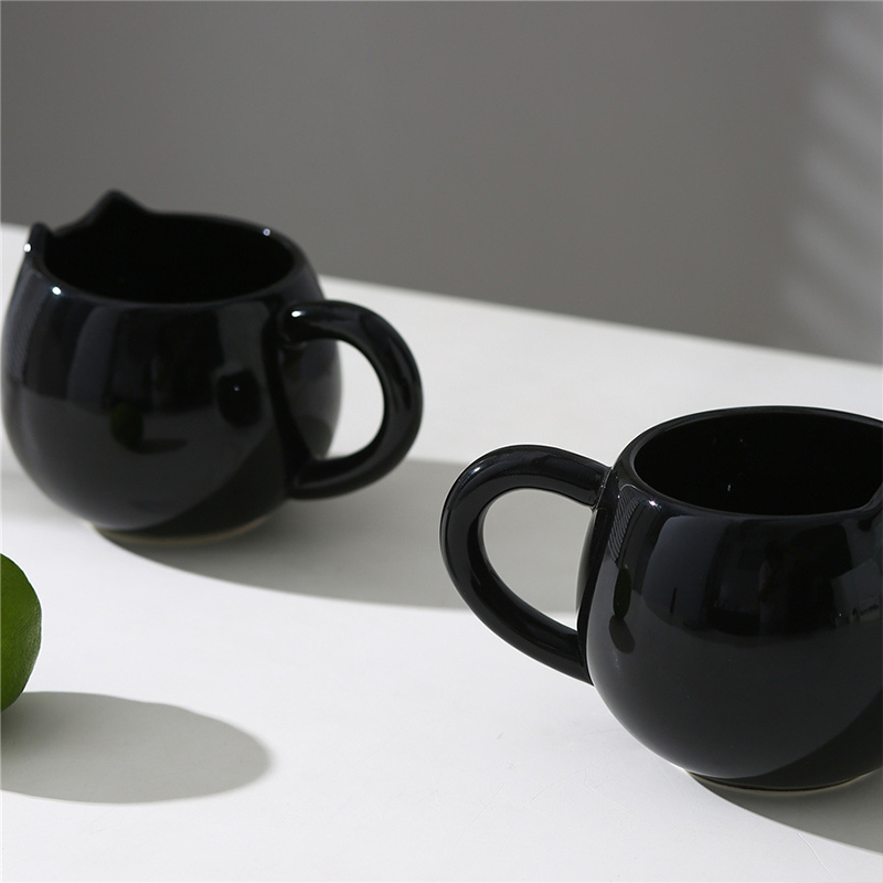 Adorable hand - painted cat - shaped ceramic mug, perfect for coffee or tea — image 3