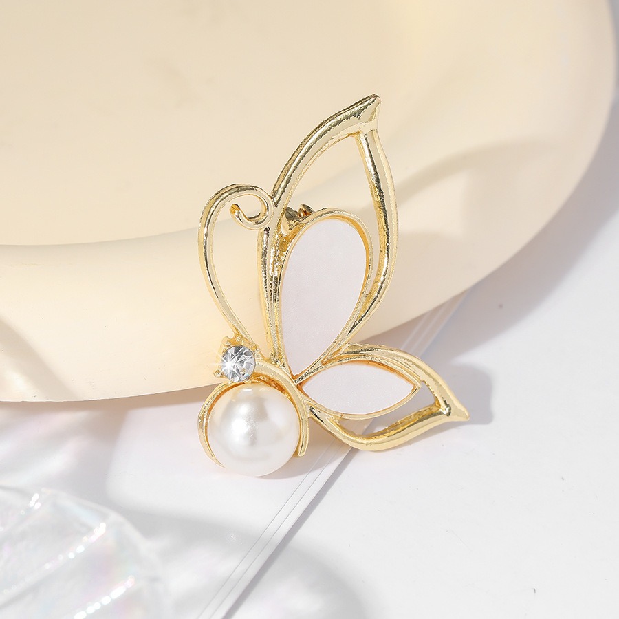 Nueva broche de mariposa de madreperla falsa, estilo hueco, para chaqueta de traje, accesorios de ropa, pins — imagen 6
