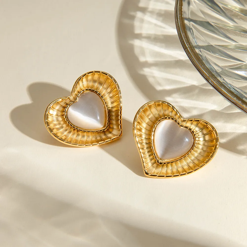 Auriculares de pendientes con piedra de ojo gato blanco en acero inoxidable de nicho temperamento — imagen 3