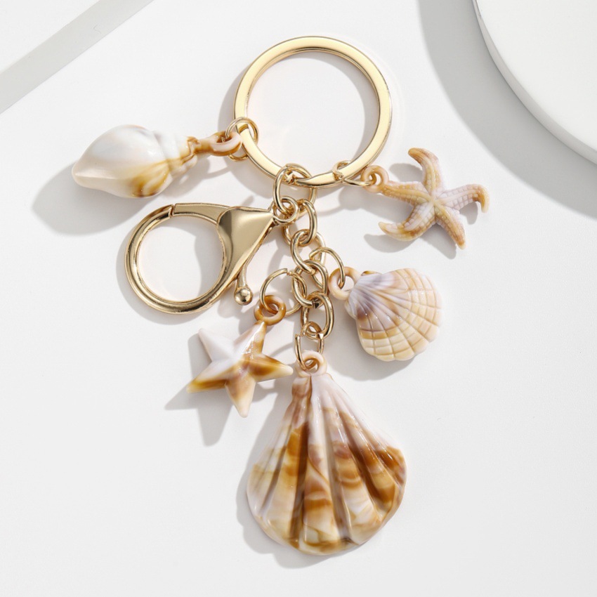Pulsera con Concha de Caracol, Estrella de Mar y Estrella de Cinco Puntos en Acetato — imagen 16