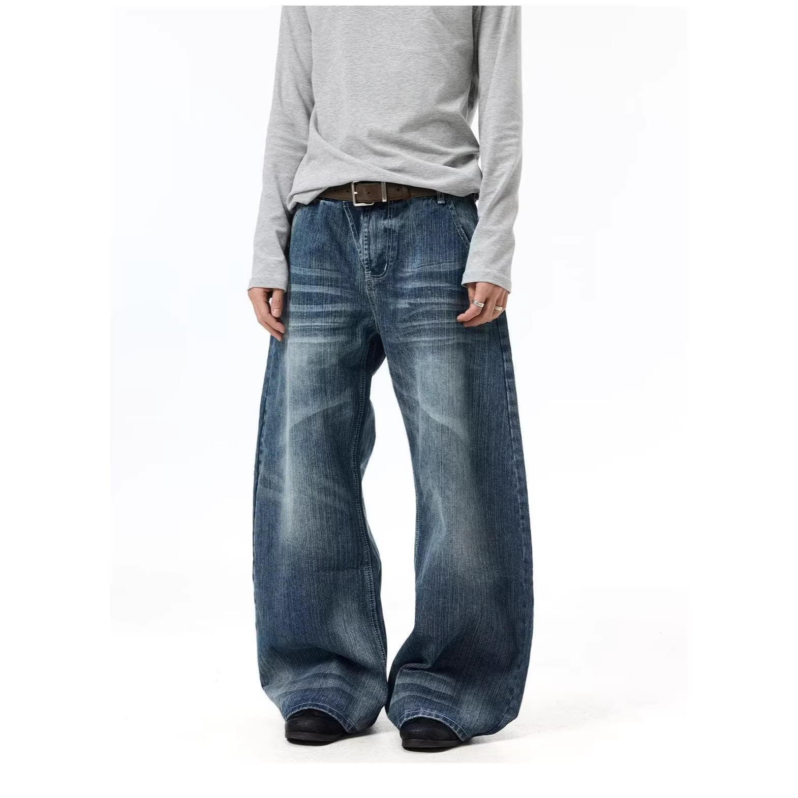 Pantalones de Denim con Ojos de Gato Desgastados y Limpieza — imagen 4
