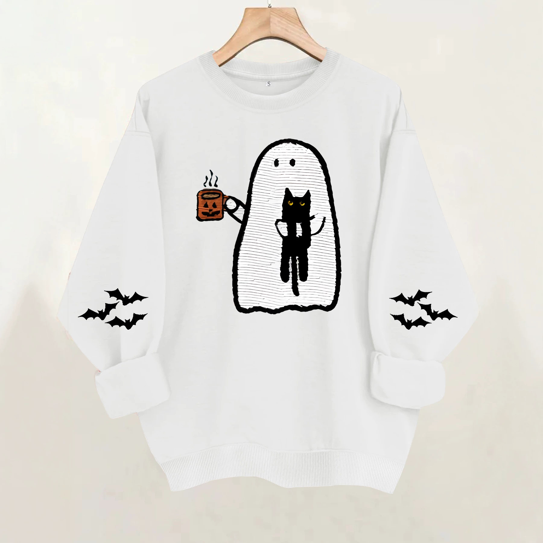 Ghost holding black cat with fleece hoodie — image 4