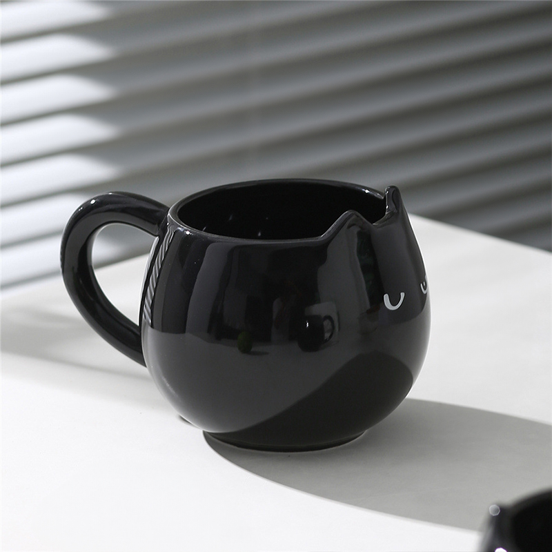Adorable hand - painted cat - shaped ceramic mug, perfect for coffee or tea — image 2