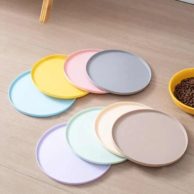 Pet meal mats are leak proof waterproof anti slip dirty and easy to cleanThey are rubber mats for cat and dog bowls and utensils — image 1