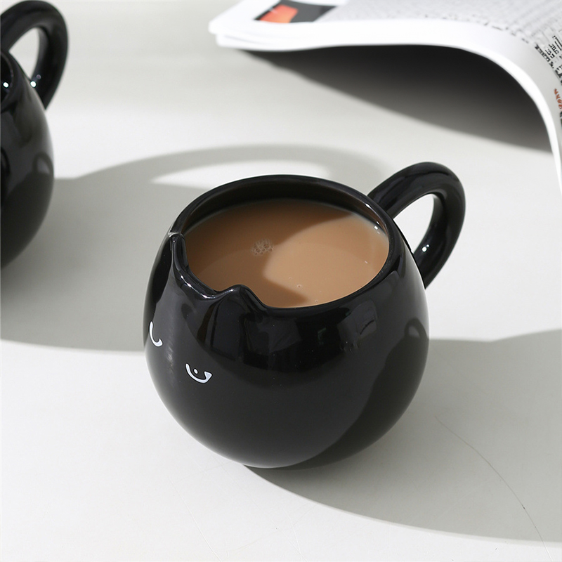 Adorable hand - painted cat - shaped ceramic mug, perfect for coffee or tea — image 5