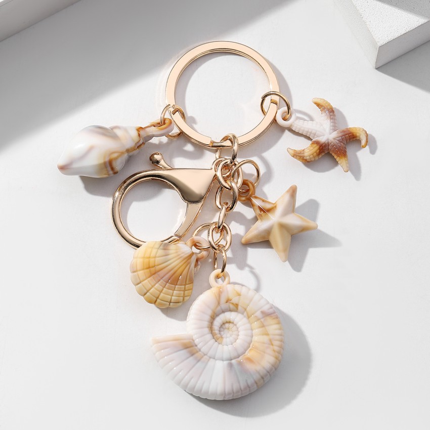 Pulsera con Concha de Caracol, Estrella de Mar y Estrella de Cinco Puntos en Acetato — imagen 17