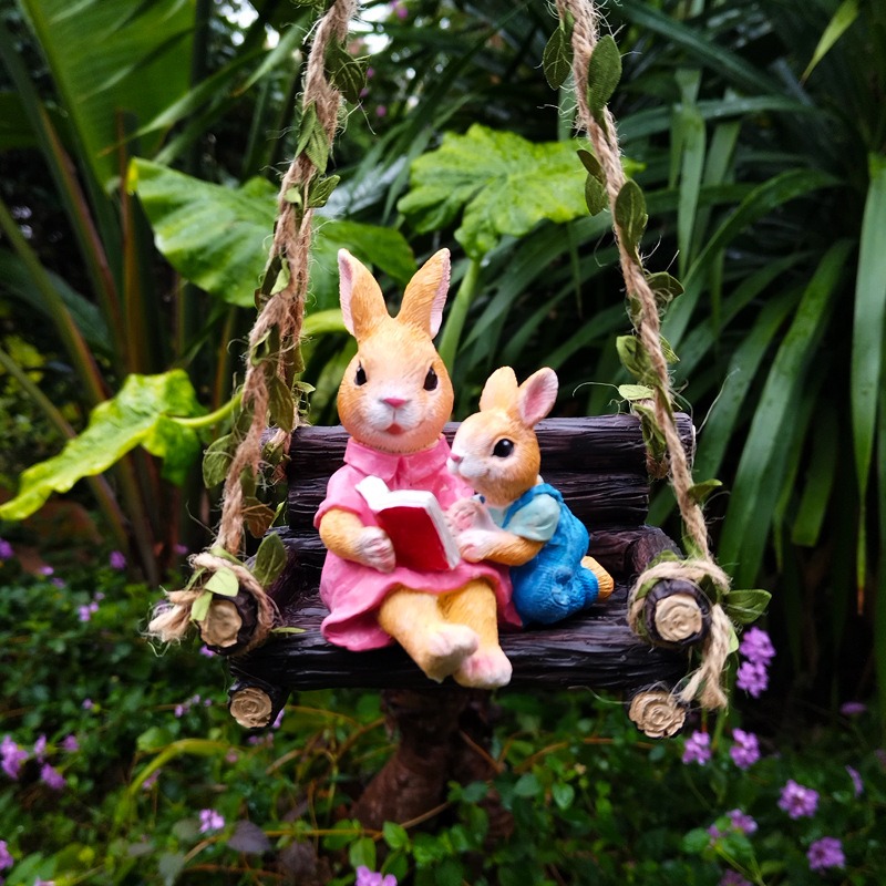 Simulated rabbit reading animal ornament — image 5
