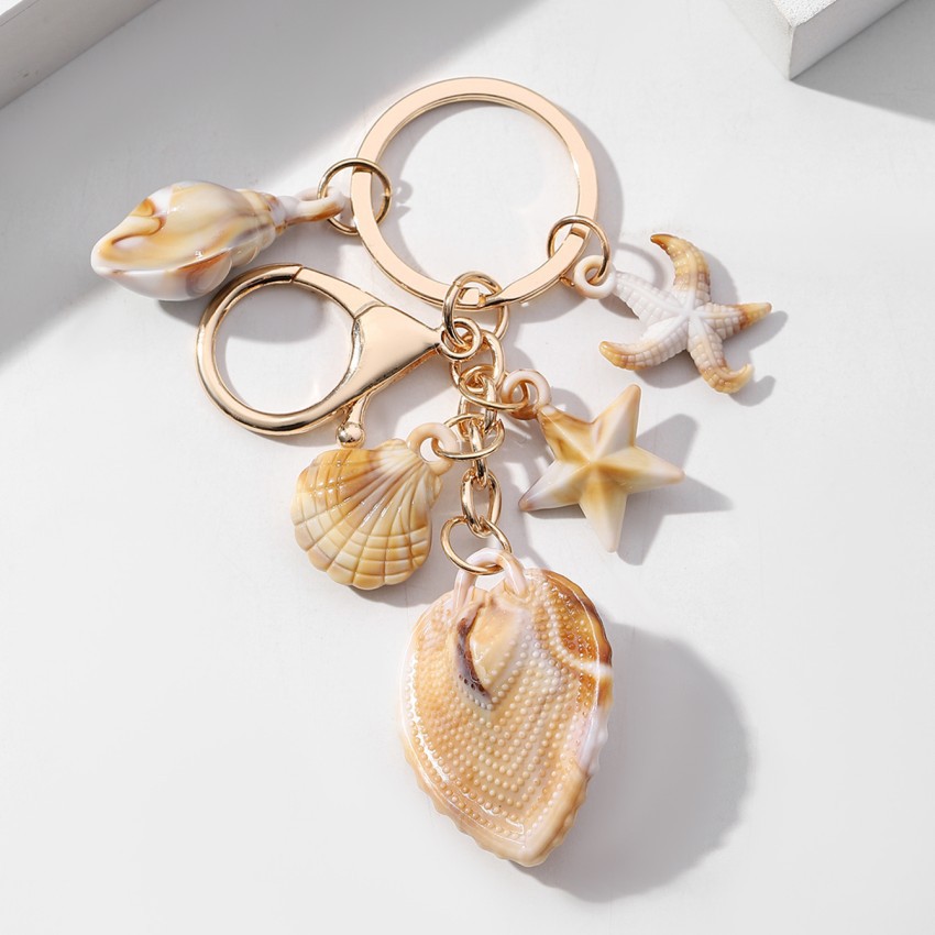Pulsera con Concha de Caracol, Estrella de Mar y Estrella de Cinco Puntos en Acetato — imagen 9