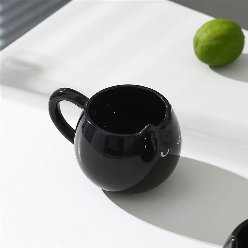 Adorable hand - painted cat - shaped ceramic mug, perfect for coffee or tea — image 4