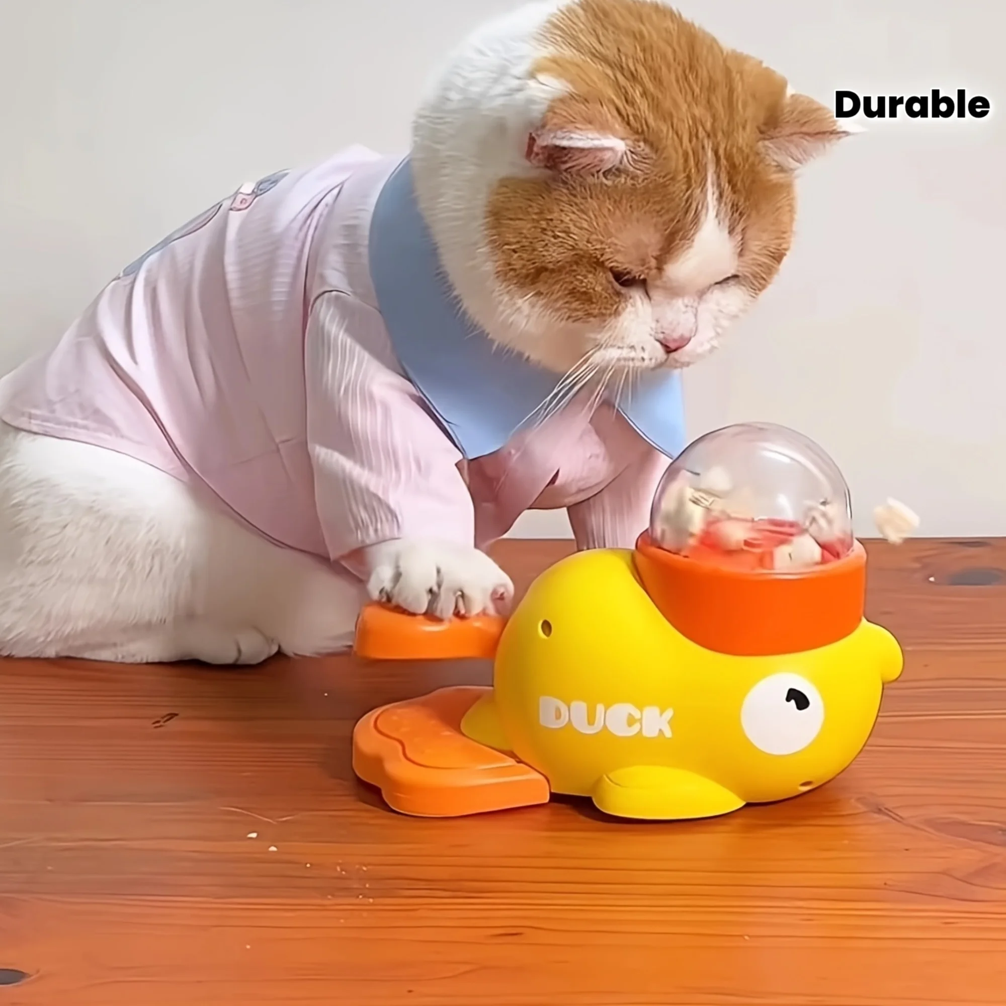 Juguetes de Alimento Interactivo para Gatos: Presionador Manual sin Baterías con Diseño de Pato — imagen 1