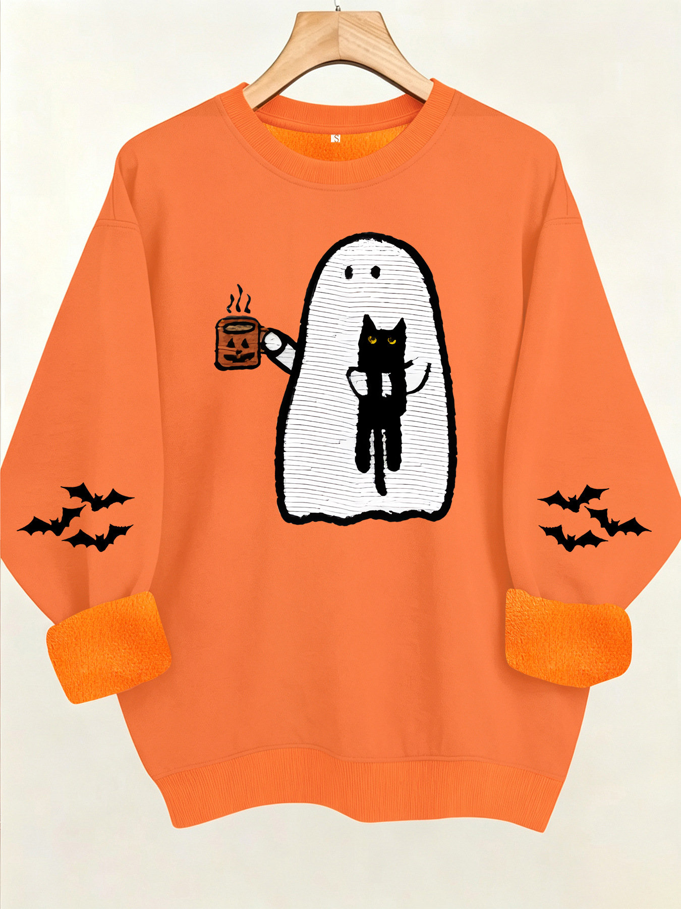 Ghost holding black cat with fleece hoodie — image 12