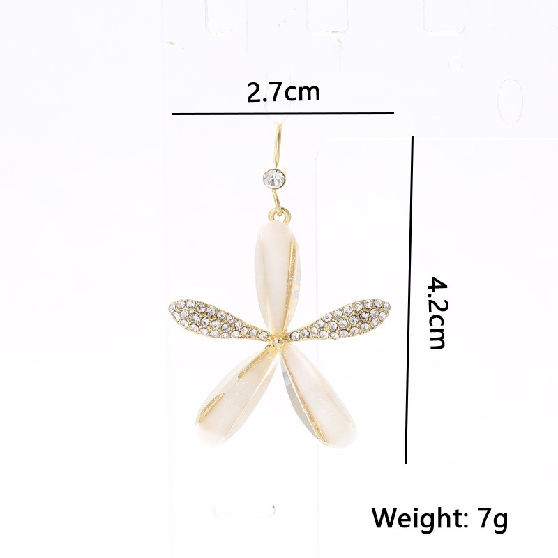 Copper plated genuine gold micro set zircon cat's eye earrings — image 5