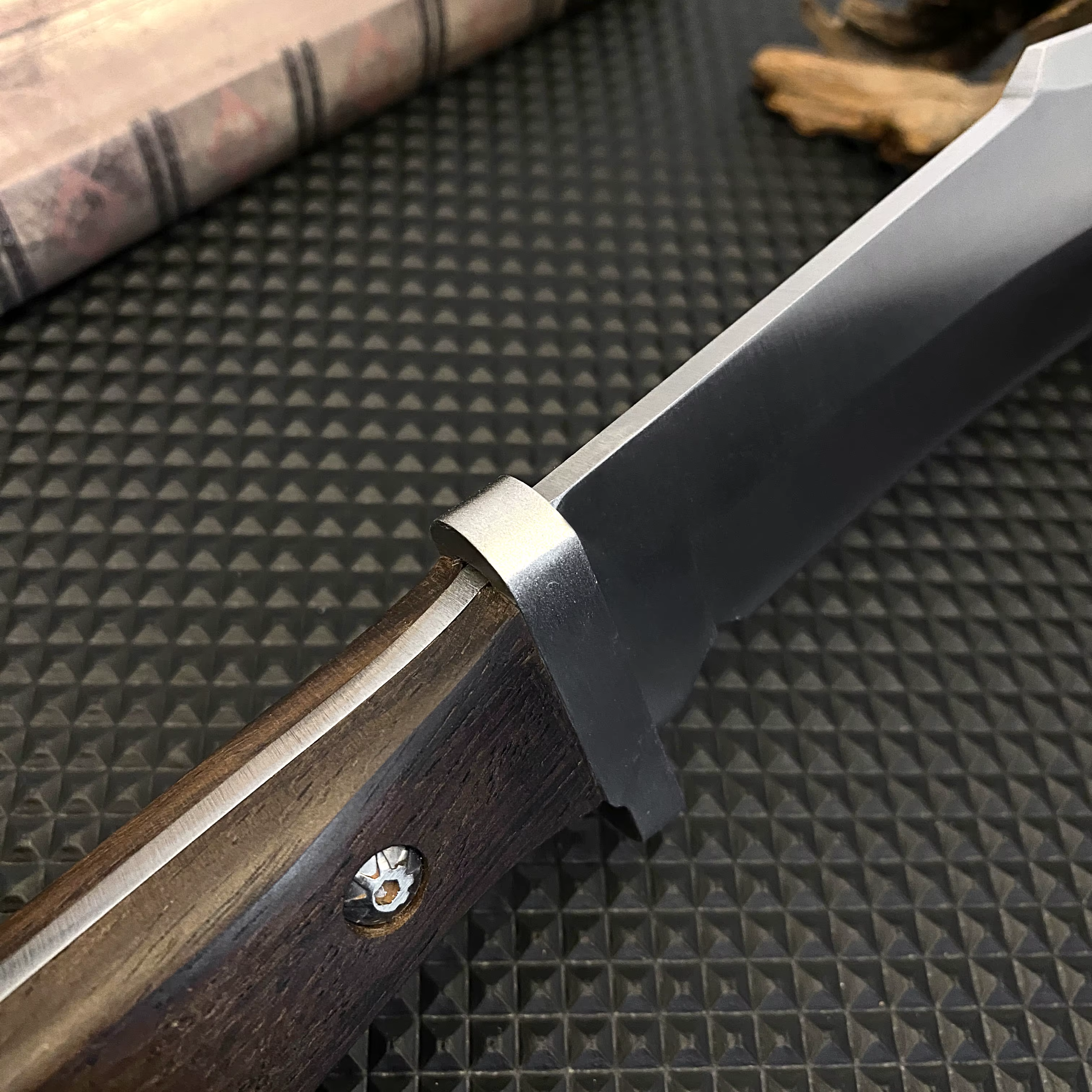 Stainless steel hunting knife with a wooden handle, paired with a black leather sheath, an essential tool for adventurers — image 4