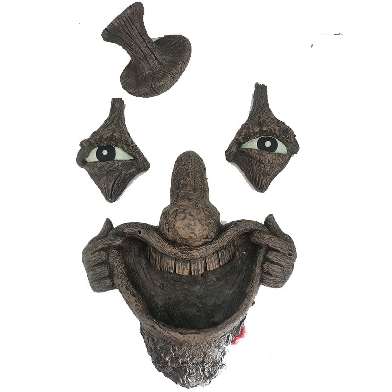 Radiant bark monster face bird feeder manual facial resin ornament — image 1