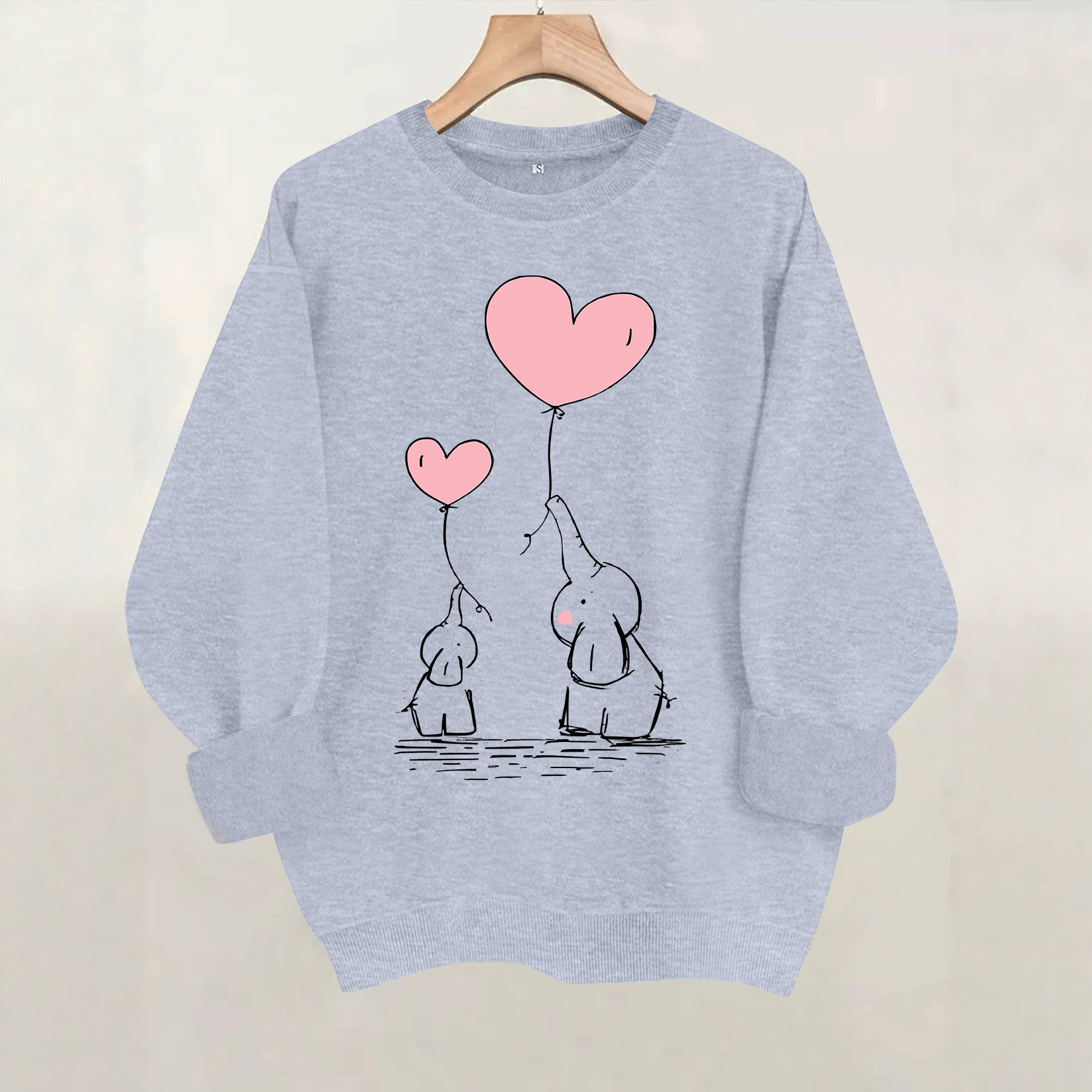 Round neck hoodie with female elephant and pink heart print — image 3
