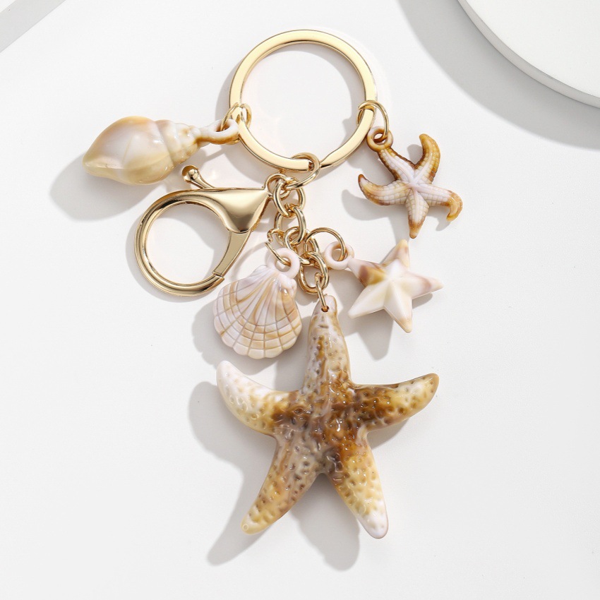 Pulsera con Concha de Caracol, Estrella de Mar y Estrella de Cinco Puntos en Acetato — imagen 3