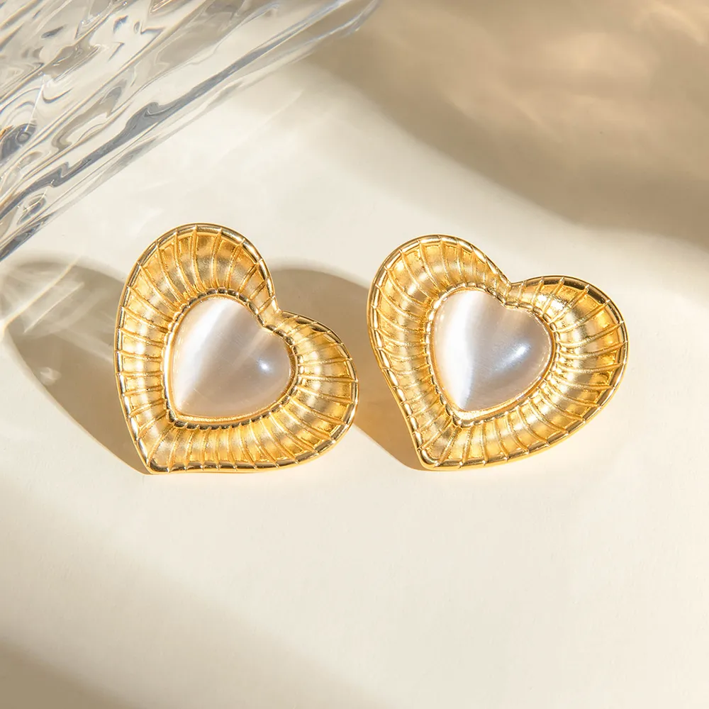 Auriculares de pendientes con piedra de ojo gato blanco en acero inoxidable de nicho temperamento — imagen 2