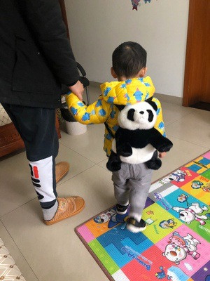 Muñeca panda de simulación mochila — imagen 1