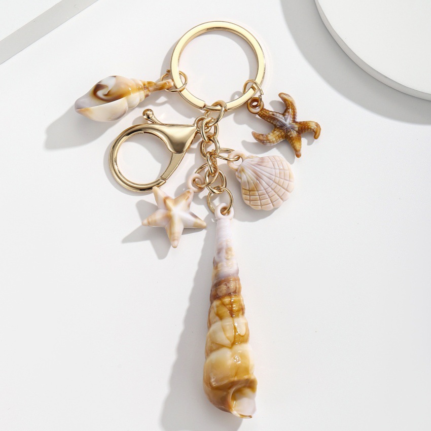 Pulsera con Concha de Caracol, Estrella de Mar y Estrella de Cinco Puntos en Acetato — imagen 4