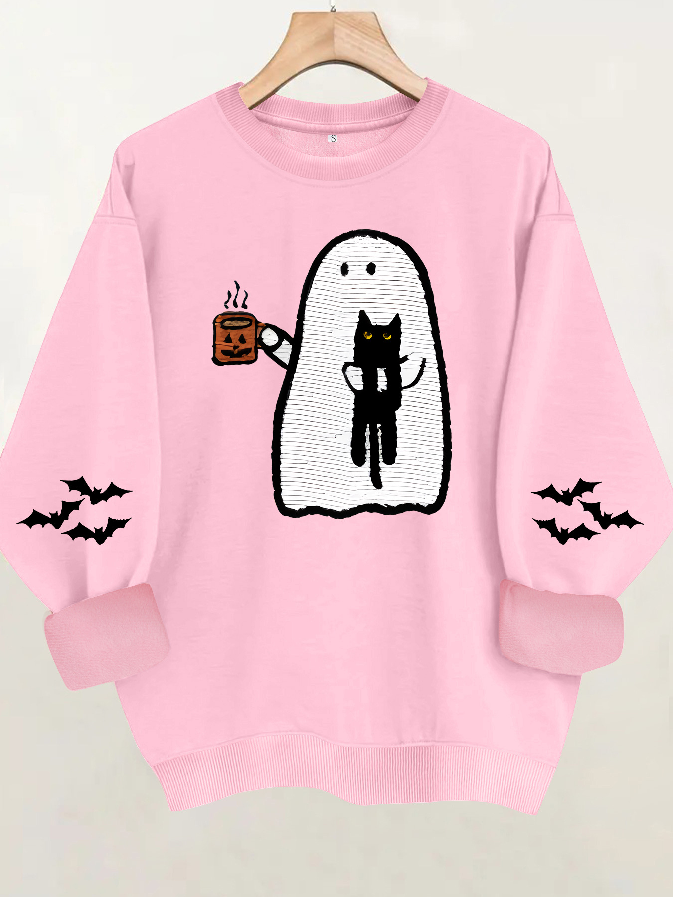 Ghost holding black cat with fleece hoodie — image 8