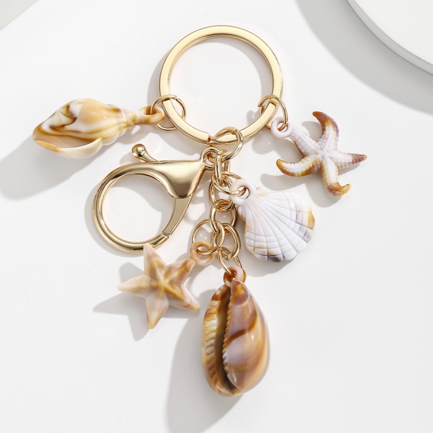 Pulsera con Concha de Caracol, Estrella de Mar y Estrella de Cinco Puntos en Acetato — imagen 12