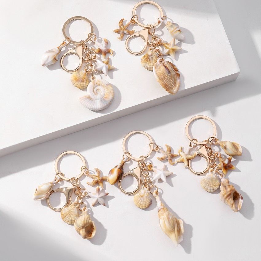 Pulsera con Concha de Caracol, Estrella de Mar y Estrella de Cinco Puntos en Acetato — imagen 1