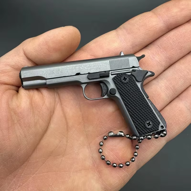 Pistola Colt 1911 PUBG a Escala 1:3, Modelo de Pistola Táctica Desmontable de Metal, Llavero de Aleación para Colección, Decoración Colgante, Regalo — imagen 3