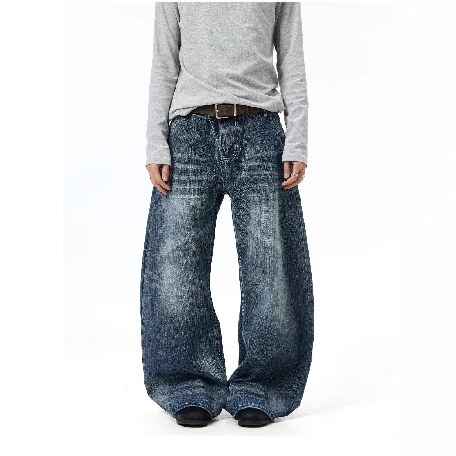 Pantalones de Denim con Ojos de Gato Desgastados y Limpieza — imagen 2