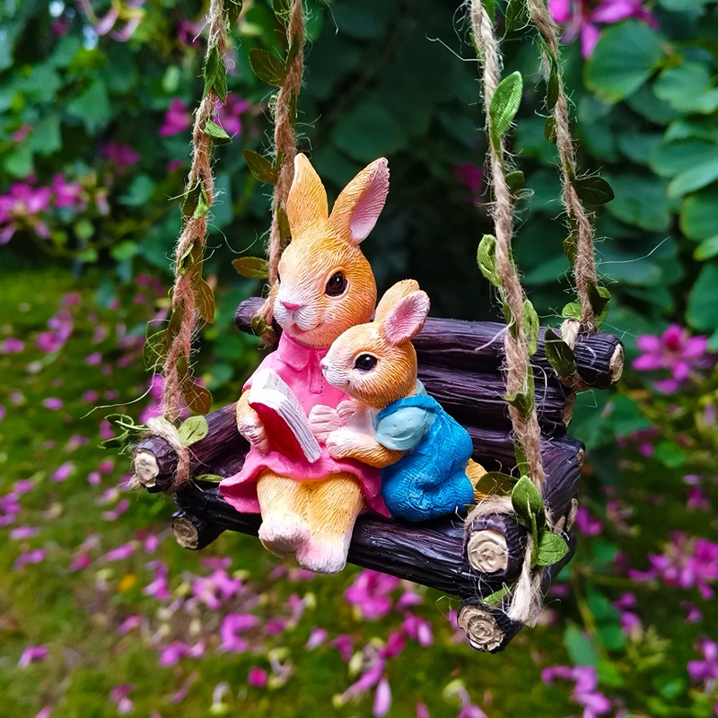 Simulated rabbit reading animal ornament — image 2
