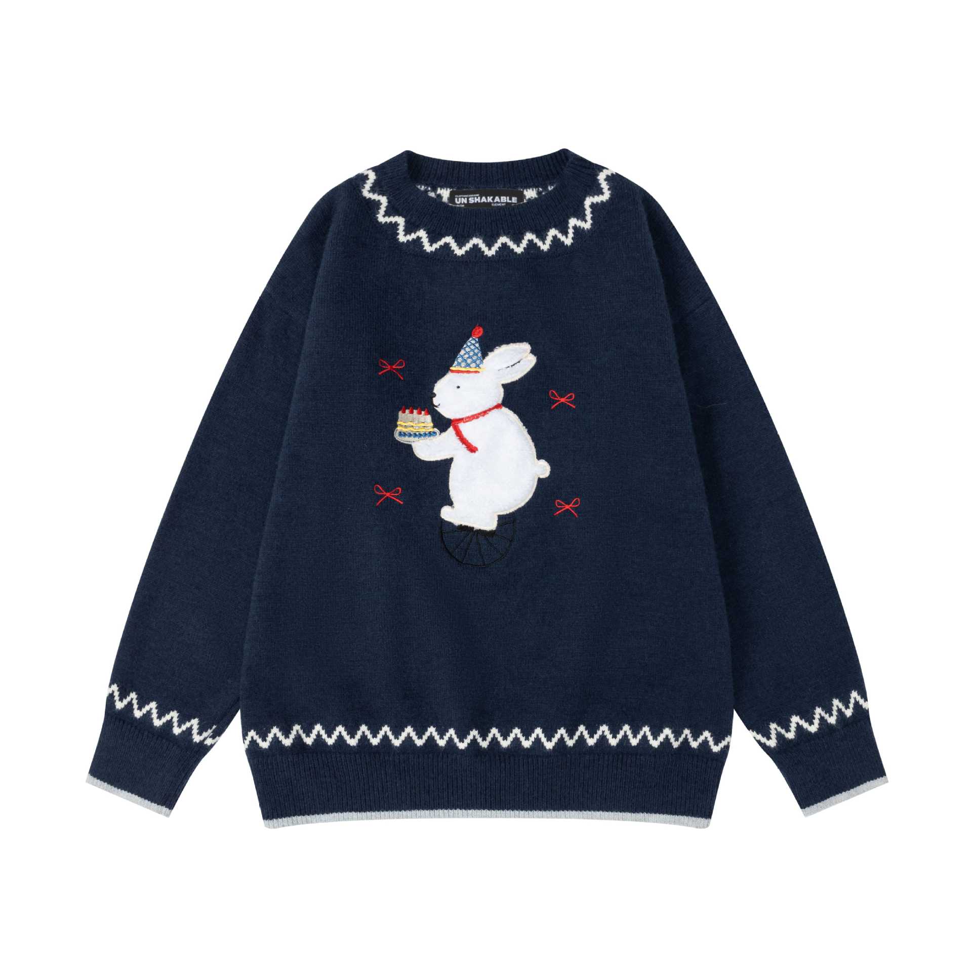 Rabbit playing with cloth sweater — image 7