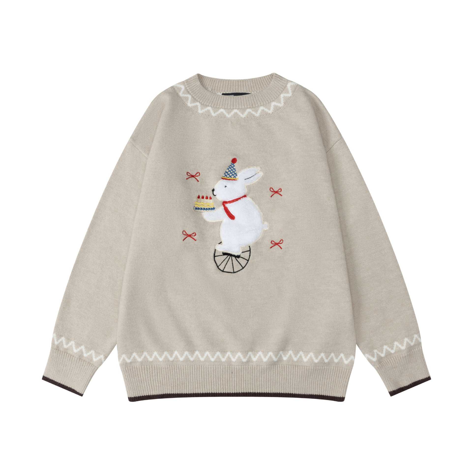 Rabbit playing with cloth sweater — image 2