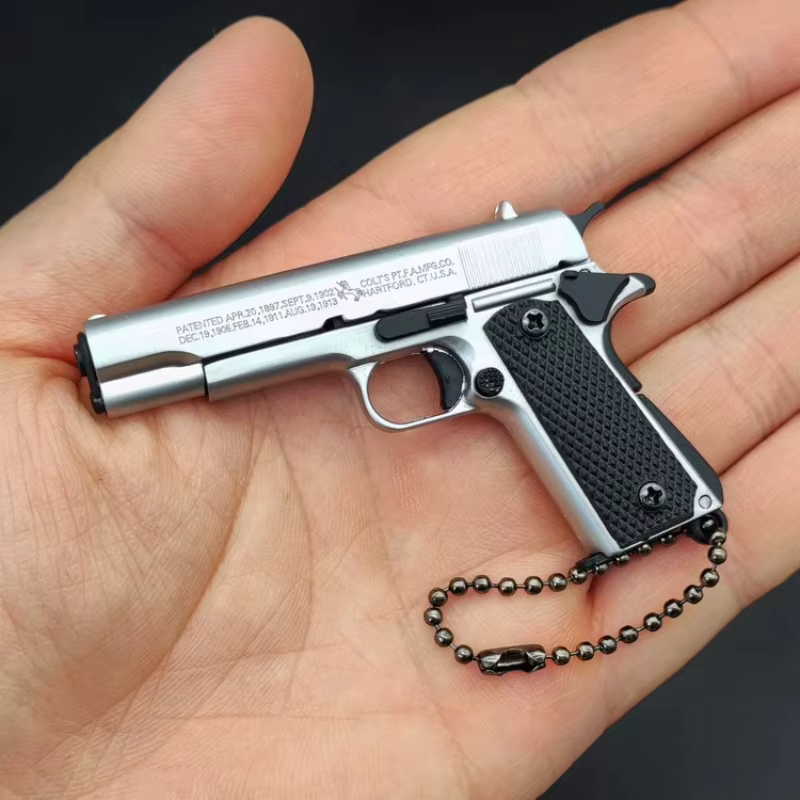 Pistola Colt 1911 PUBG a Escala 1:3, Modelo de Pistola Táctica Desmontable de Metal, Llavero de Aleación para Colección, Decoración Colgante, Regalo — imagen 2
