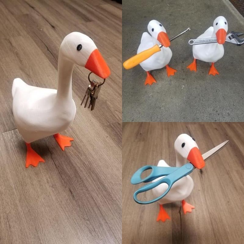 Estatua de Pato con Succión Magnética y Cuchillas para Hogar - Decoración de Resina — imagen 1