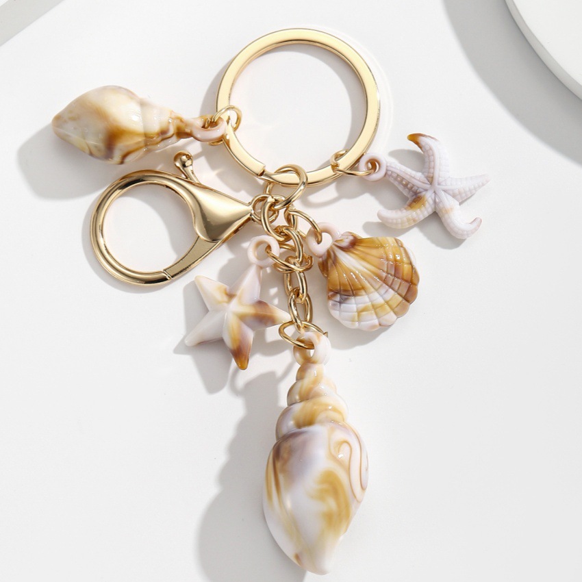 Pulsera con Concha de Caracol, Estrella de Mar y Estrella de Cinco Puntos en Acetato — imagen 6