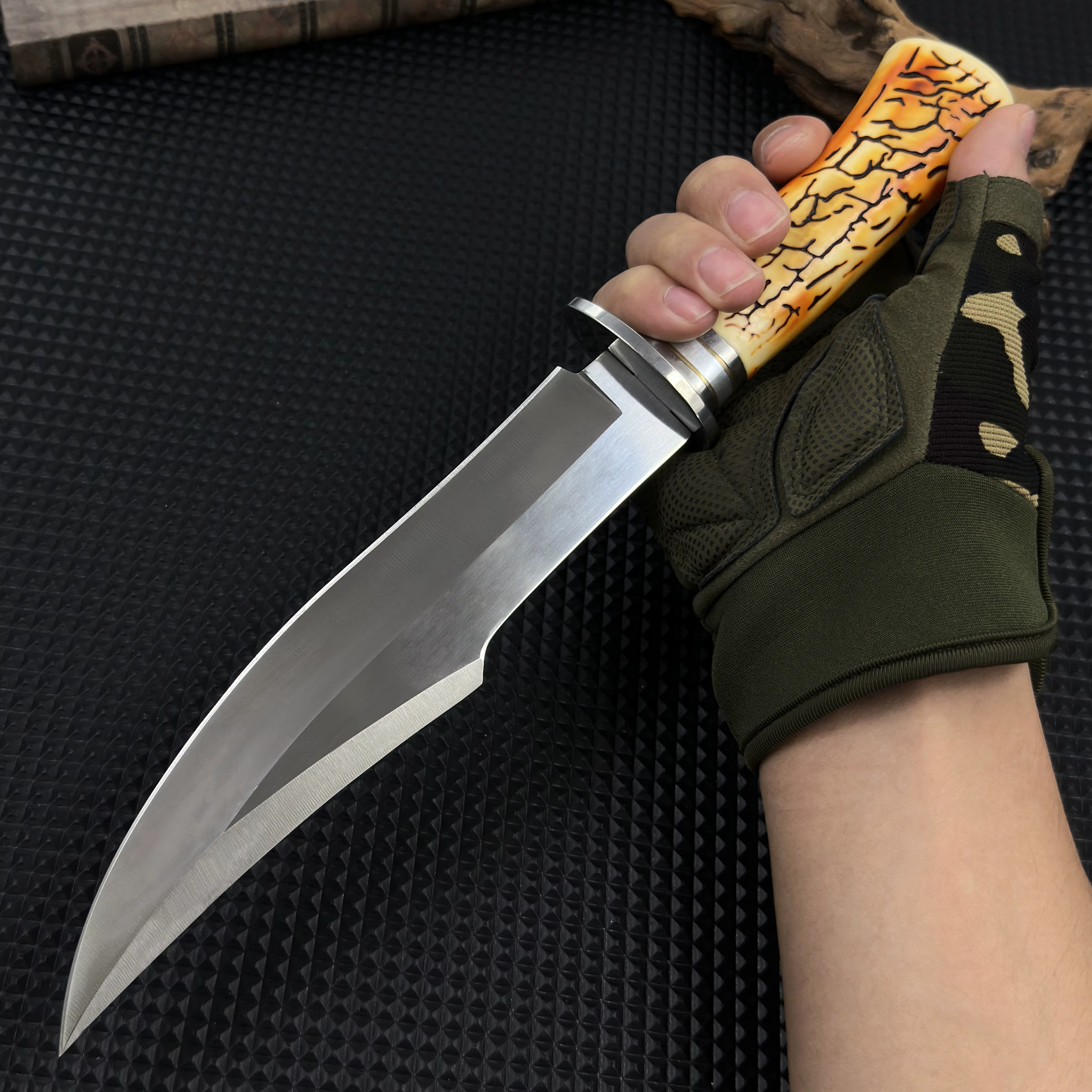 This stainless steel survival knife, equipped with a durable sheath, is invaluable for constructing shelters during outdoor — image 3
