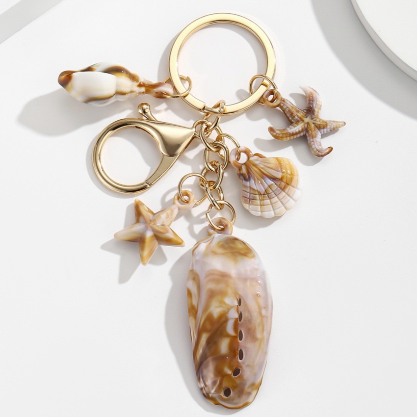 Pulsera con Concha de Caracol, Estrella de Mar y Estrella de Cinco Puntos en Acetato — imagen 5