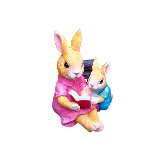 Simulated rabbit reading animal ornament — image 1
