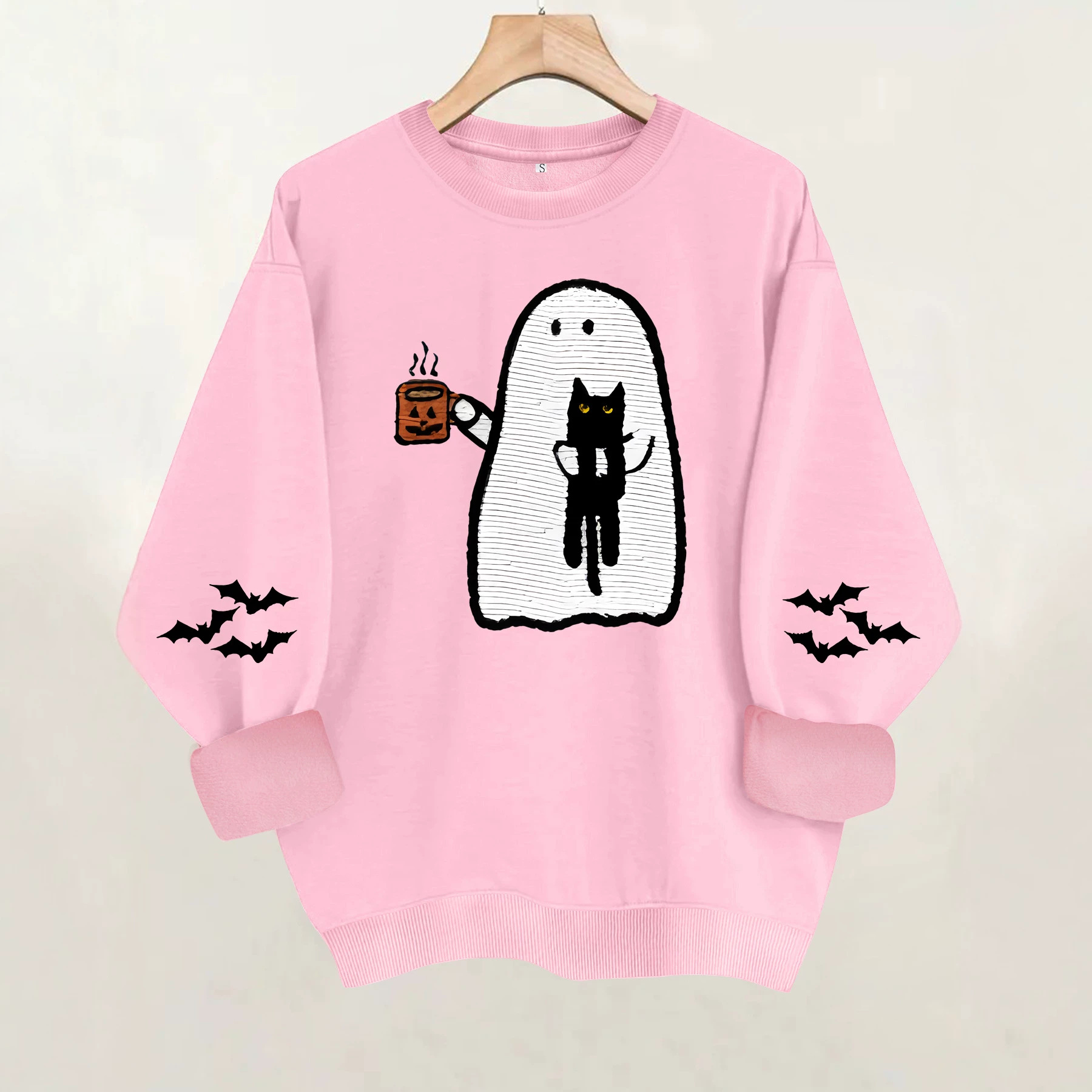 Ghost holding black cat with fleece hoodie — image 5